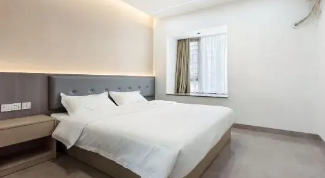 Кровать в общем номере Xile Seaview Homestay (Nanyu Shuangmianhai Branch)