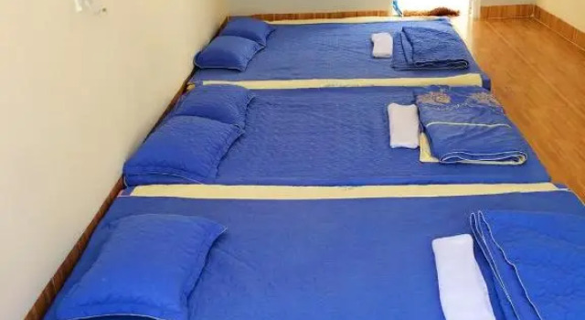 Кровать в общем номере Bot Bien Homestay