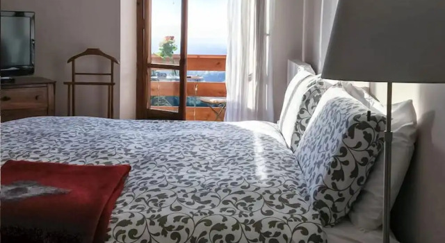 Habitación doble Estándar con balcón y con vista a la montaña B&B Villa Tavallini