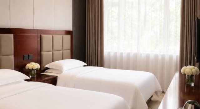 Wusu Ruihua Business Hotel, Rezervați Hotel Usu China