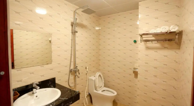 Кровать в общем номере Friend Hotel Hà Giang