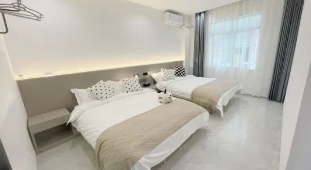 Семейный люкс с 3 комнатами Xiamen Yuehaishu Hotel (Huangcuo Beach Branch on Huandao Road)