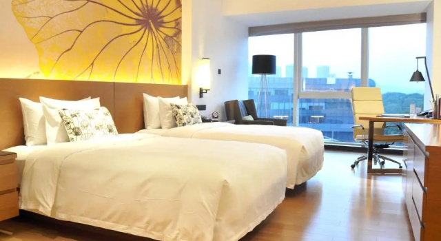 Standard Twin room with garden view Wingtech Hotel