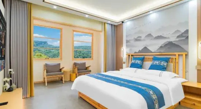 Люкс Deluxe Mount Emei Jiuyue Homestay (Emeishan Scenic Area Zero Kilometer Branch)