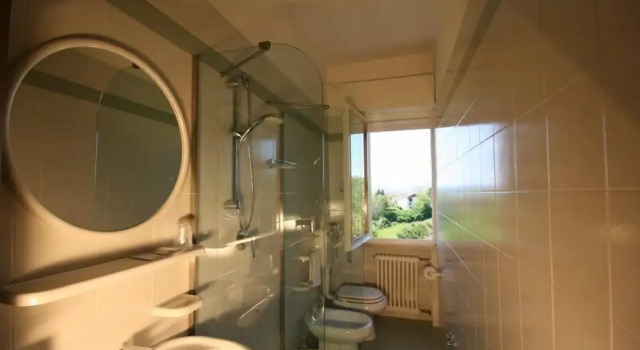Четырёхместный номер Standard с балконом и с видом на окрестности Albergo Centopini