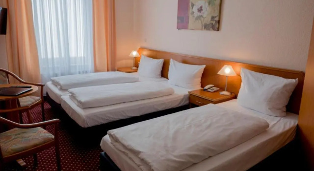 Трёхместный номер Standard Hotel Lumen am Hauptbahnhof