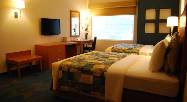 Четырёхместный номер Standard Rio Vista Inn Business High Class Hotel Poza Rica