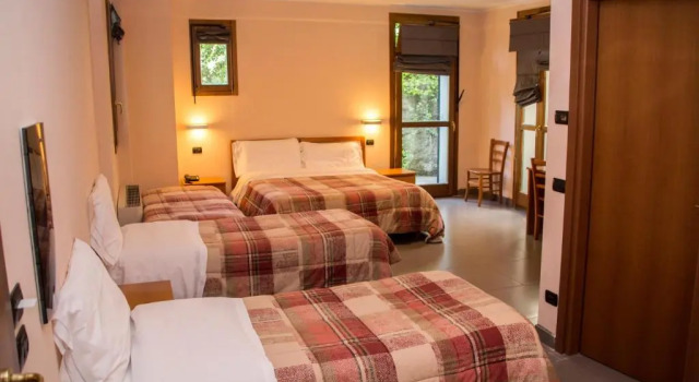 Четырёхместный номер Standard Parini Hotel