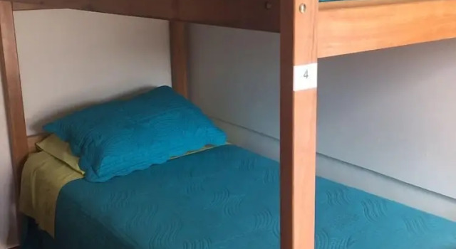 Кровать в общем номере Siete Colores Hostel
