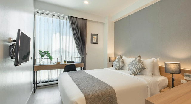 Кровать в общем номере Nap in Chiangmai