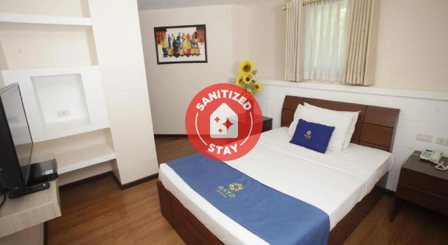 Кровать в общем номере Star Hotel Davao