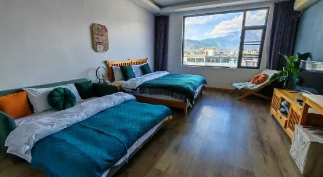 Кровать в общем номере Date jade dragon snow mountain view guest house