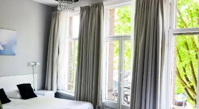 Кровать в общем номере Family Hotel Kooyk