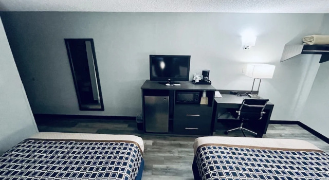 Четырёхместный номер Standard Americas Choice Inn & Suites