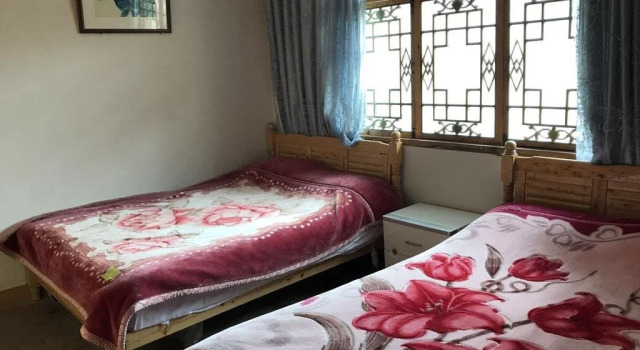 Songpan Yi Xin Yuan Hostel, Boek Hostel Songpan Sichuan
