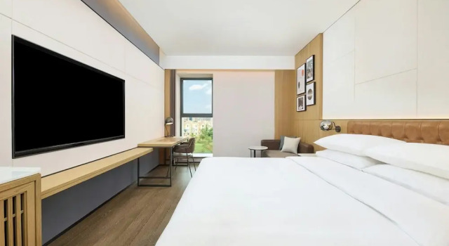Четырёхместный номер Standard с видом на сад Four Points by Sheraton Kunming Changshui Airport