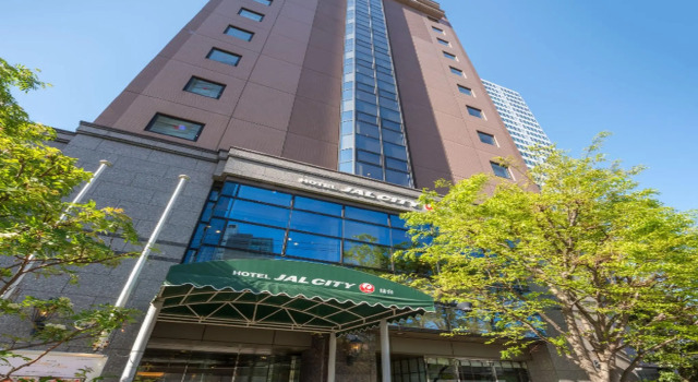 Кровать в общем номере Hotel JAL City Sendai