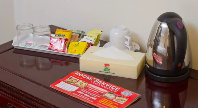 Кровать в общем номере Lotus Family Hotel, Medan Tuanku