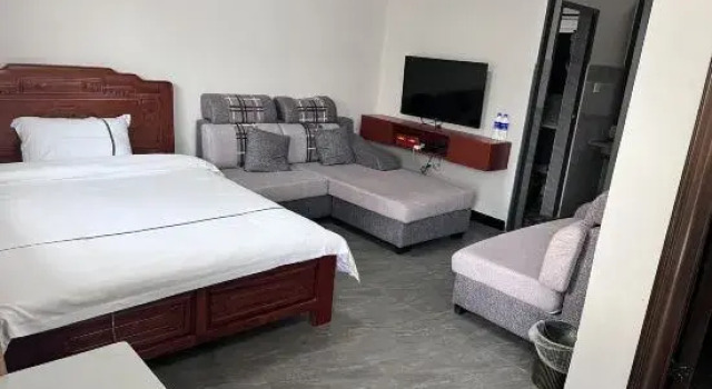 Семейный люкс Jinghong Zhiyuan Kangning Keke Inn