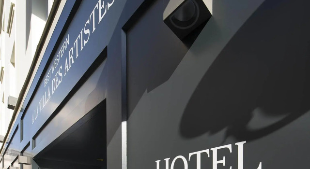 Кровать в общем номере Hôtel A La Villa des Artistes