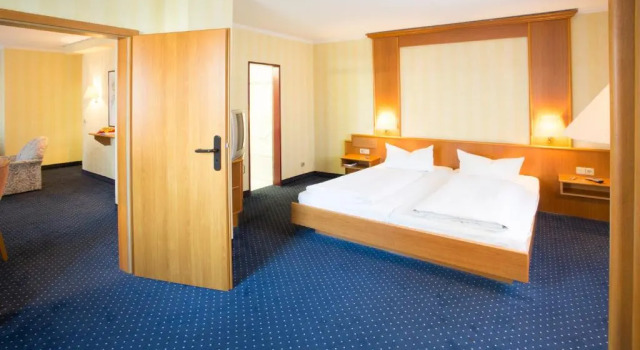 Кровать в общем номере Fly Inn Hotel Frankfurt Airport Rüsselsheim ehemals Trip Inn Hotels