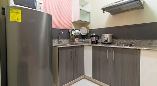 Студия JMM Apartment Suites