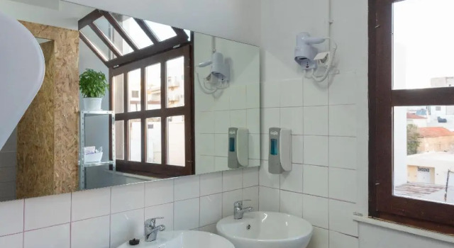 Кровать в общем номере Intra Muros Hostel
