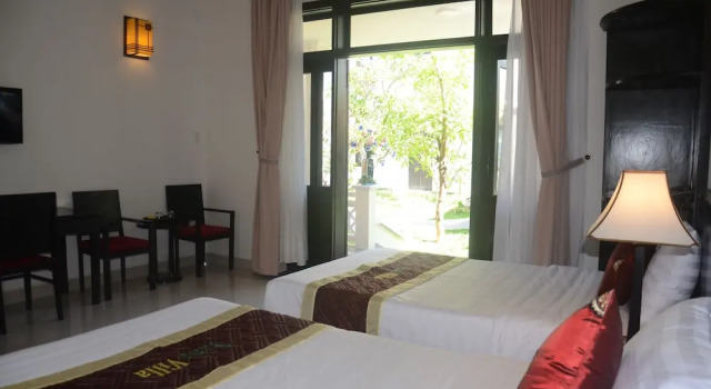 Номер Deluxe с балконом и с видом на сад Hoi An Red Frangipani Villa