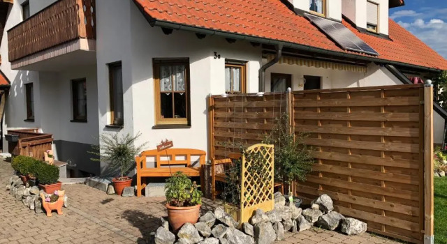 Апартаменты Ferienhaus Ferienwohnung Aretsried
