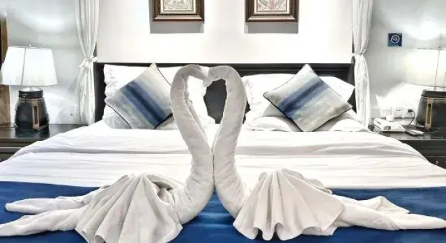 Семейный люкс Xishuangbanna Jinghong Wanji Lijing Hotel