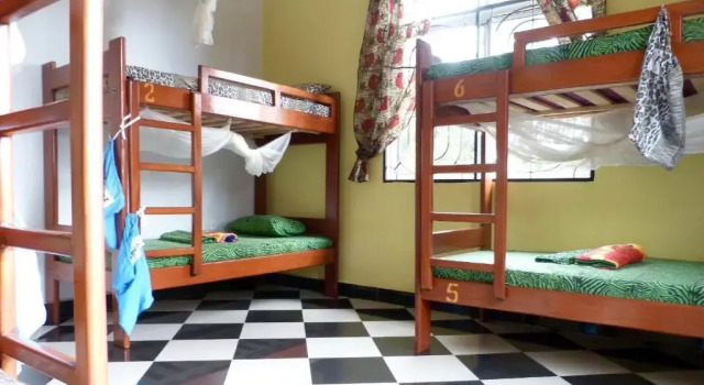 Łóżko w pokoju wieloosobowym Rafiki Backpackers & Guesthouse