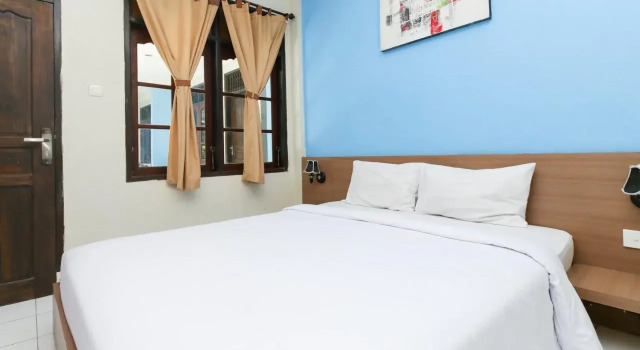 Wijaya Guesthouse Kuta RedPartner, Забронировать Отель Отели в центре Легиан, в центре