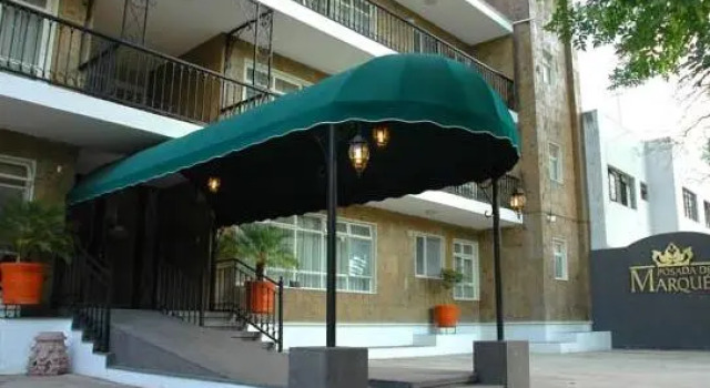 Кровать в общем номере Del Marques Hotel and Suites