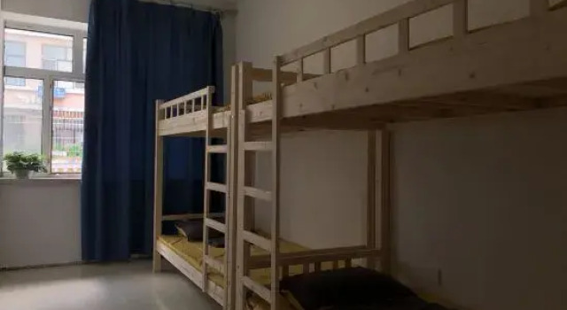 Кровать в общем номере Fuyuan Dongshijie Youth Hostel