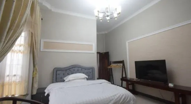 Люкс с 3 комнатами Dongxing Guomen e Homestay