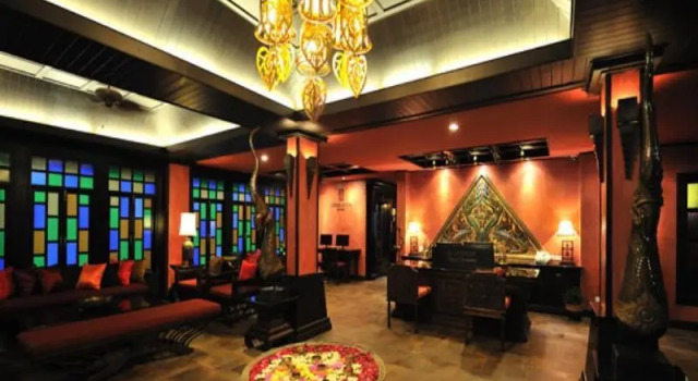 Кровать в общем номере Siralanna Hotel