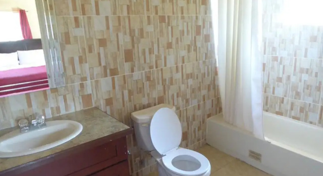 Семейные апартаменты с 2 комнатами рядом с пляжем Paradise  Beach Front Apartment
