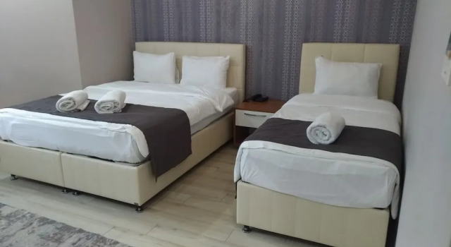 Четырёхместный семейный номер Standard Grand Dost Hotel