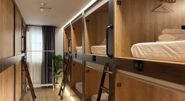 Кровать в общем номере The POD Suite Hostel Blasco