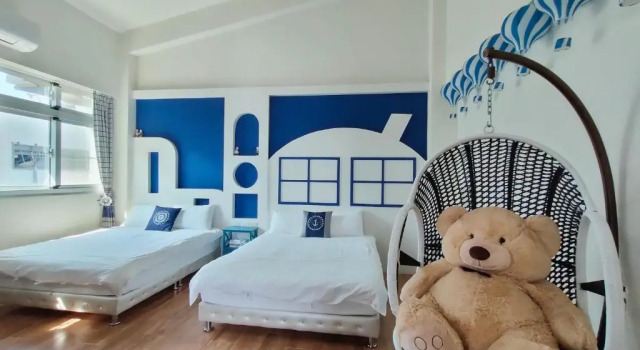 Четырёхместный номер Standard с балконом Xiao Ya Homestay