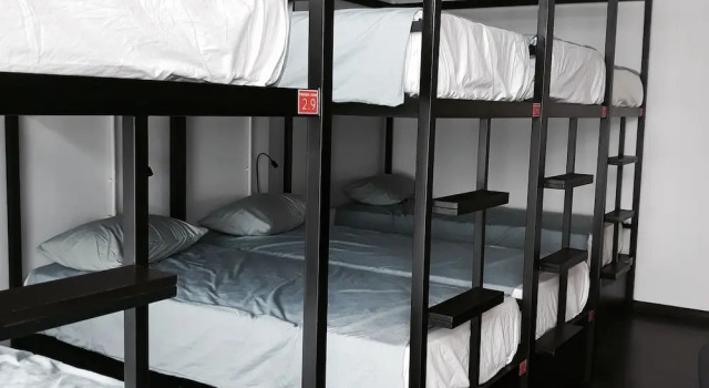 Кровать в общем номере Penthouse Hostel & Spa