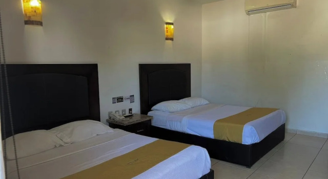 Четырёхместный номер Executive Hotel Maioris Guadalajara
