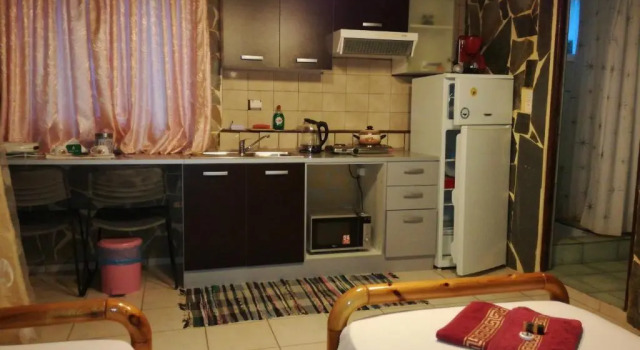 Студия с видом на сад Apartments Zoumperi