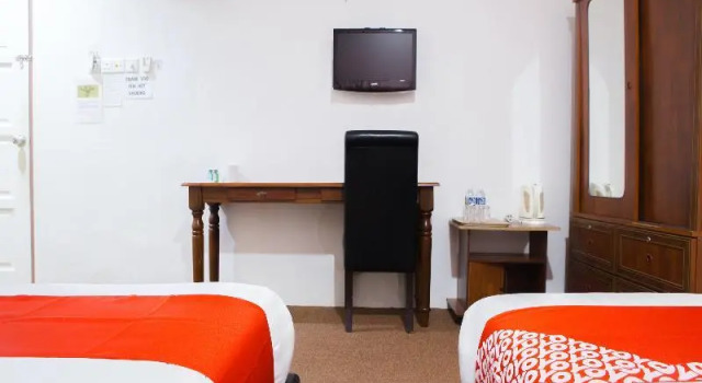 Четырёхместный люкс OYO 90037 The 7 Lodge Tambunan