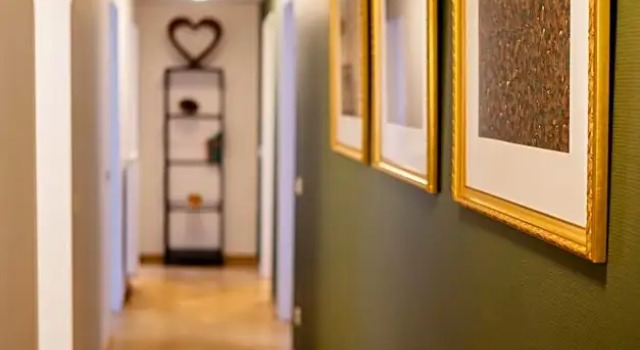 Кровать в общем номере с 3 комнатами Apparthotel Bad Schandau by STEIGER Hotels