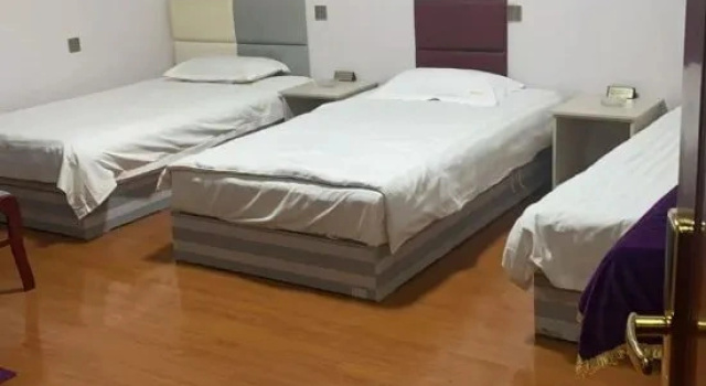 Letto in camerata Yiming Business Hotel
