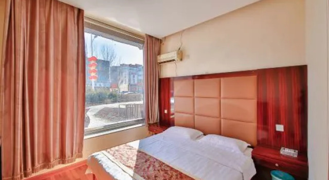 Четырёхместный люкс Deluxe Xinghe Jinjiang Business Hotel
