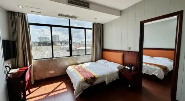 Двухместный люкс Deluxe Xianglong Business Hotel