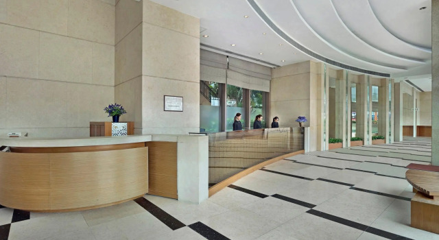 Łóżko w pokoju wieloosobowym Rambler Oasis Hotel