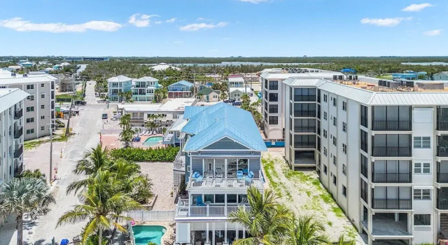 Коттедж ~island Girl~ Immaculate Gulf Front Duplex 5 Bedroom Home by RedAwning